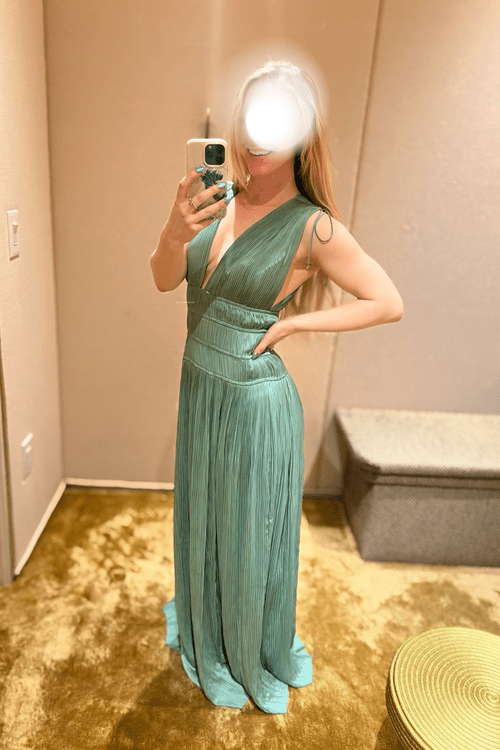 Ava Marie in an elegant green dress